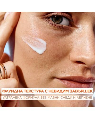 Garnier Ambre Solaire Слънцезащитен флуид с витамин С, SPF50+, 40 ml - 4