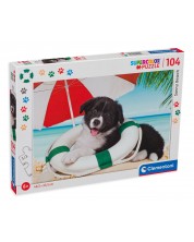 Пъзел Clementoni от 104 части - Кученце на плажа